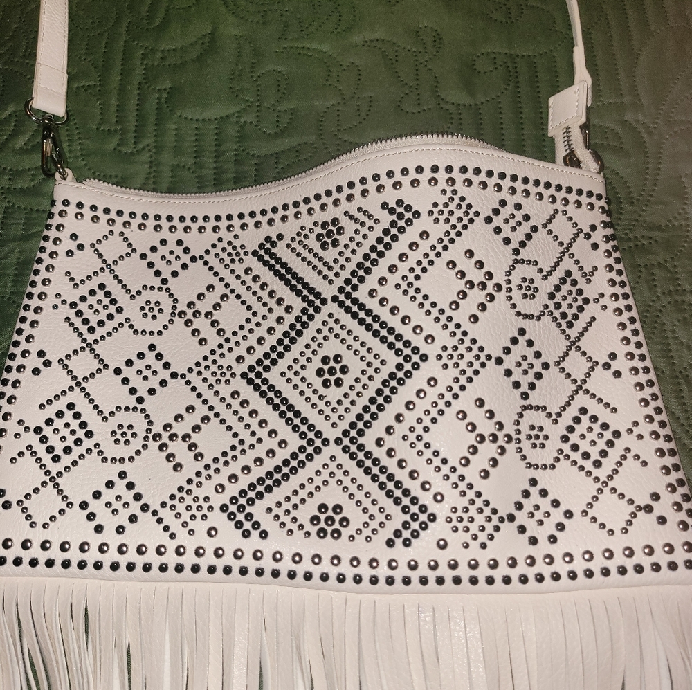 Charming Charlie studded fringe bag.